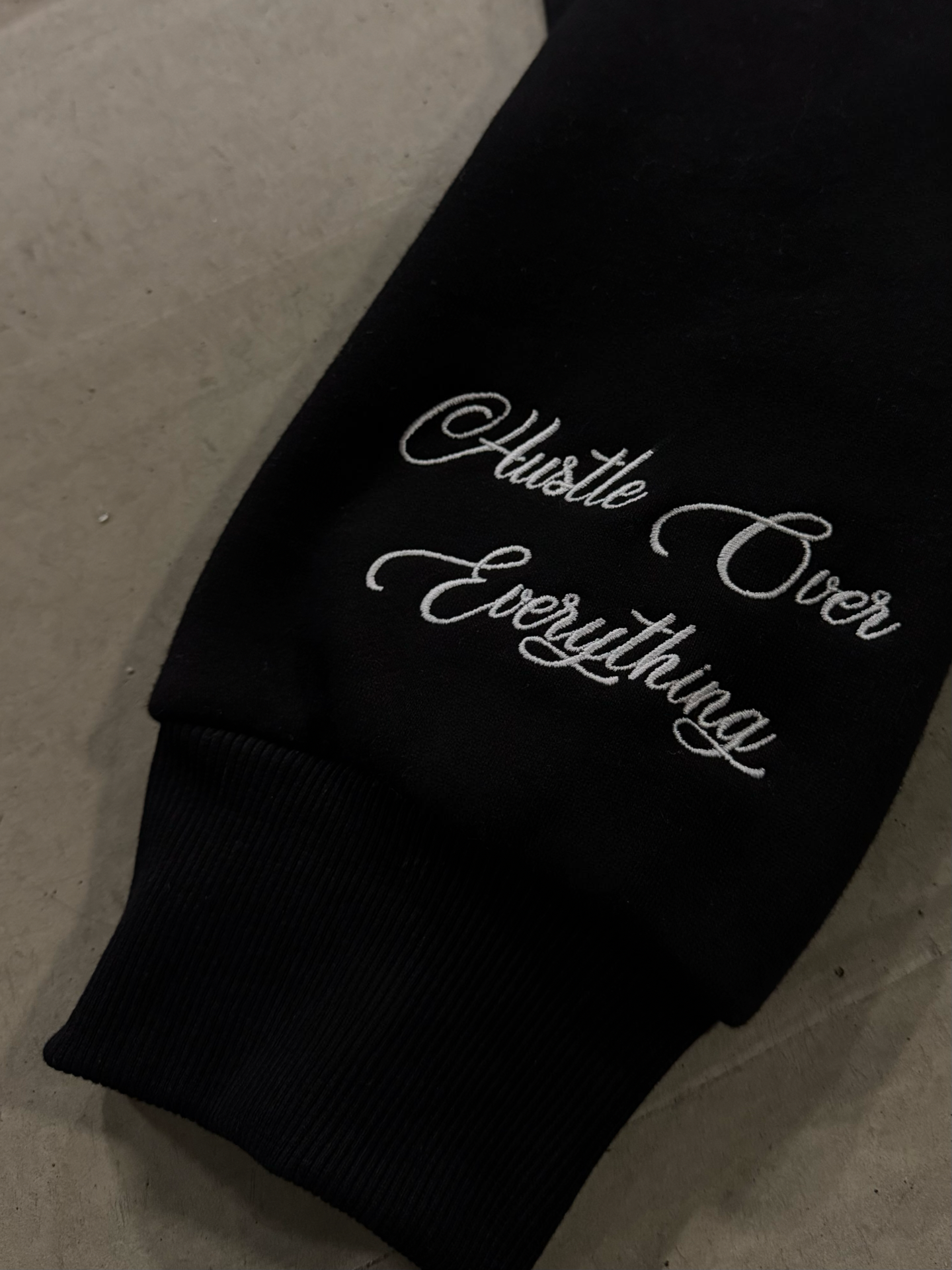 HUSTLE OVER EVERYTHING HOODIE